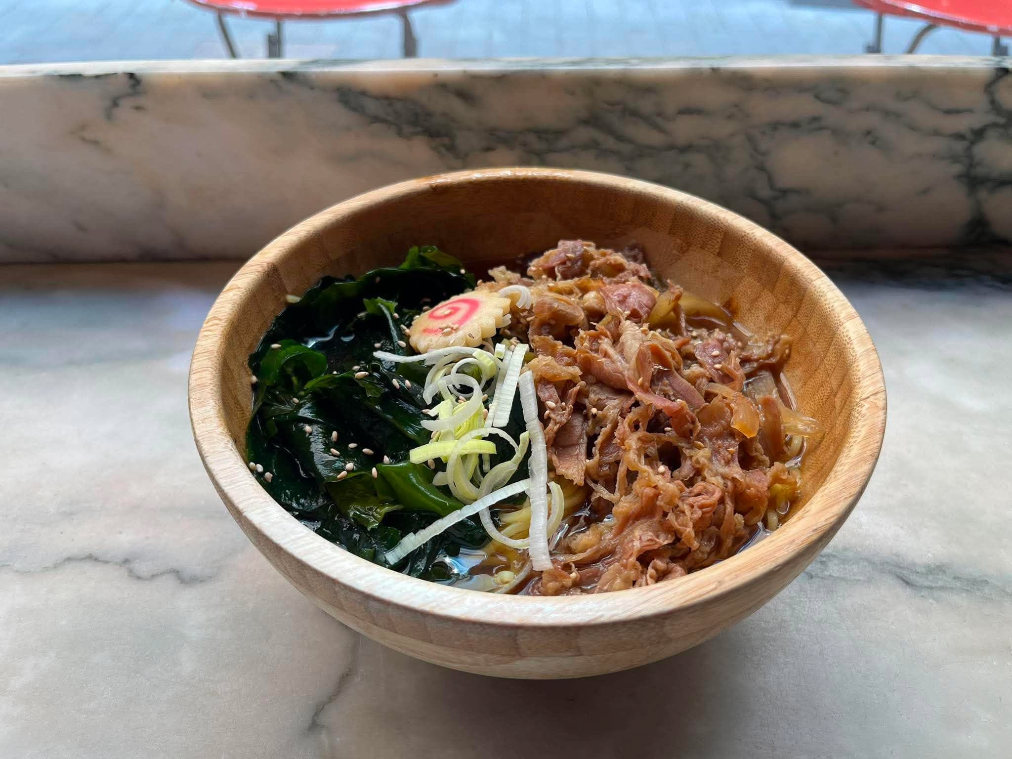 Beef ramen at Donburi near St Paul's, London — simmered beef, wakame, naruto and spring onion in a shoyu broth